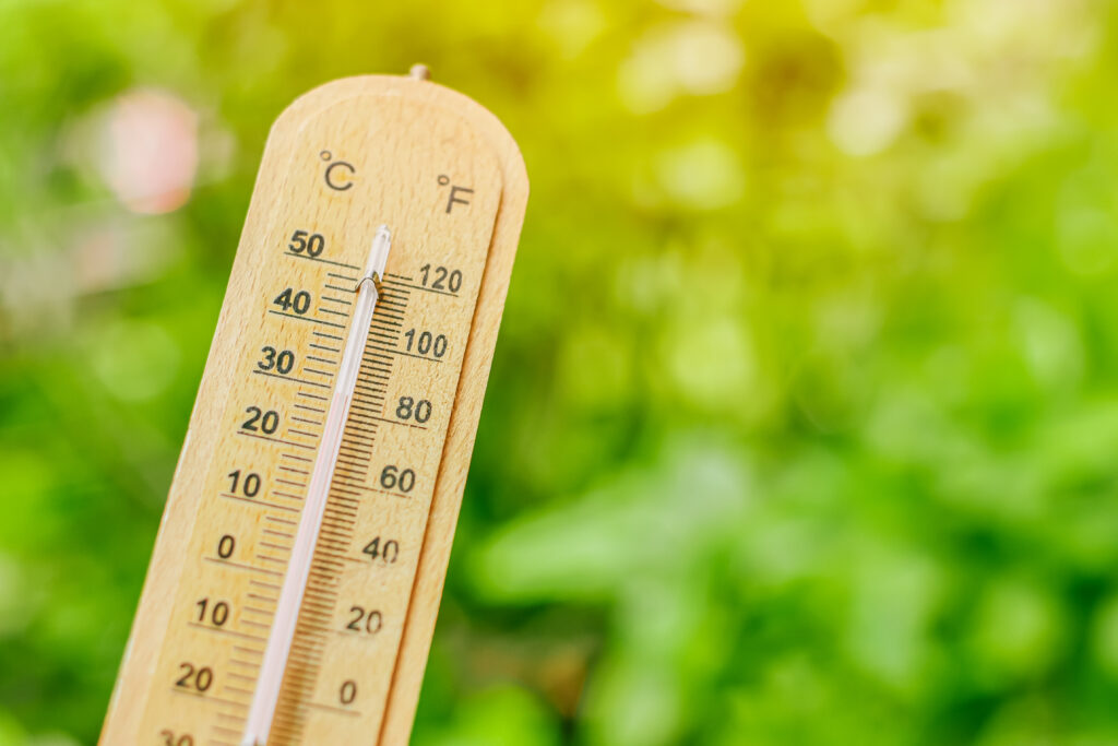 thermometer-with-blur-green-background-for-cooling-2025-03-05-21-16-47-utc